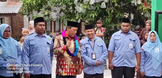 Kakan Kemenag Kampar Hadiri Pengukuhan dan Pelepasan Siswa MTsN 8 Kampar, Tekankan Pentingnya Akhlak dan Prestasi